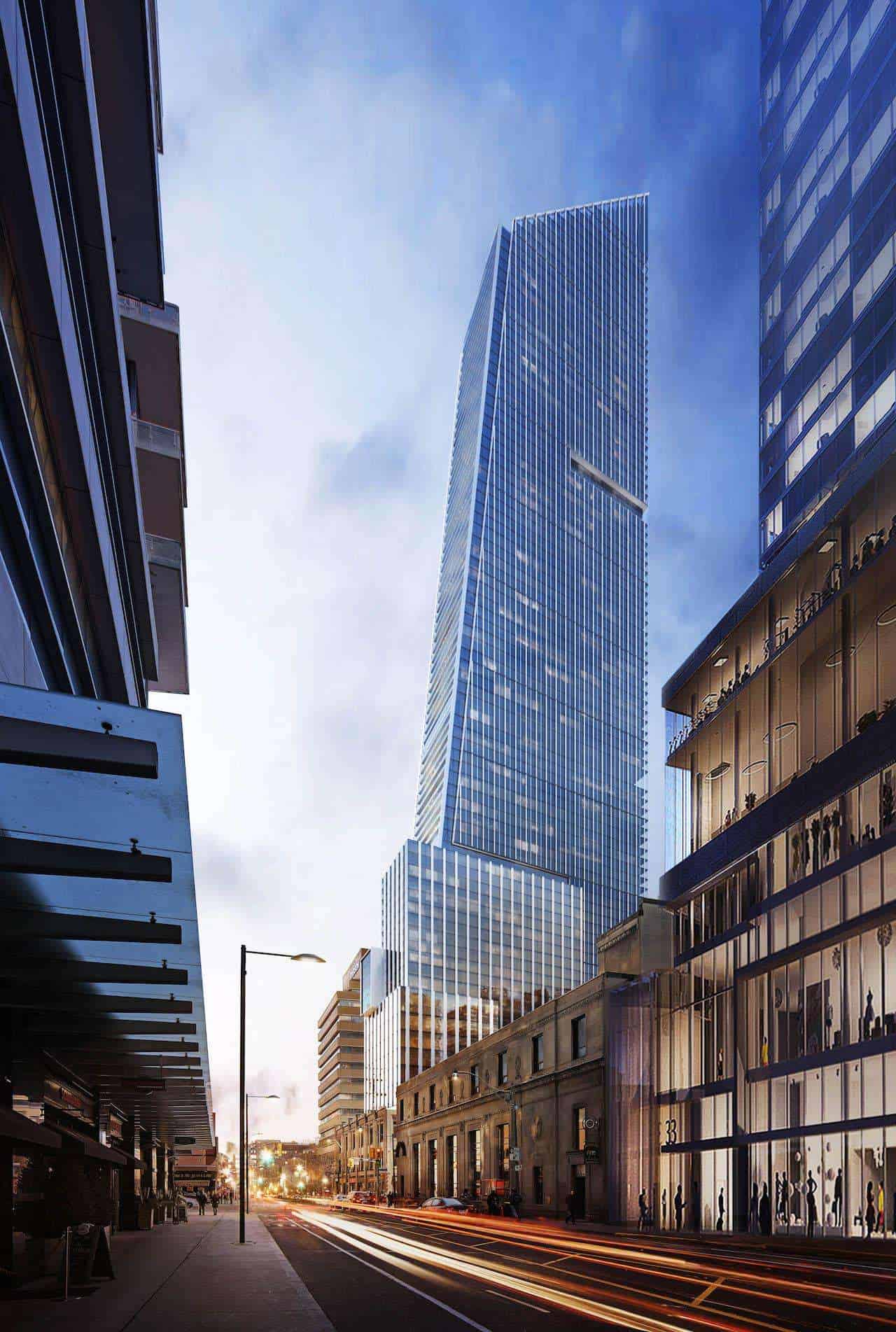 Street-level dusk rendering of the Concord Sky glass tower rising above a heritage streetscape