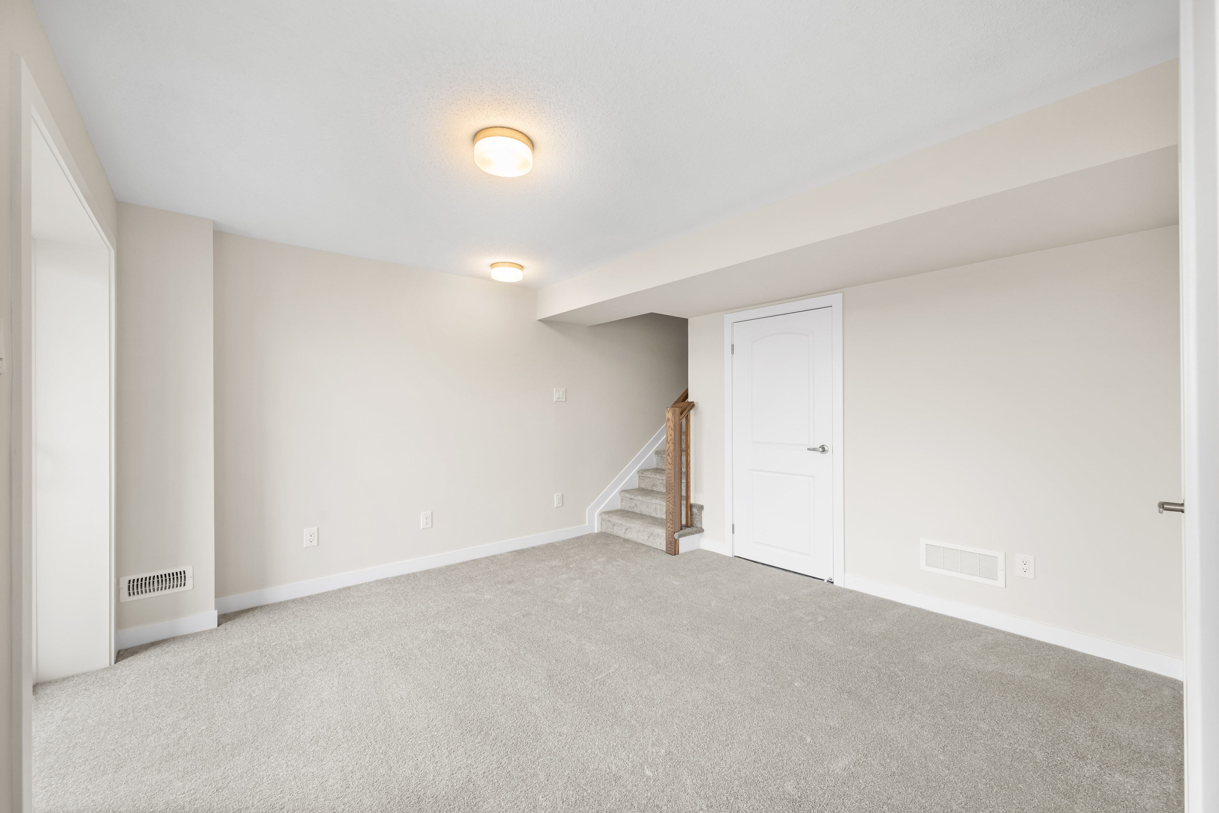 Finished basement recreation room, included with every home