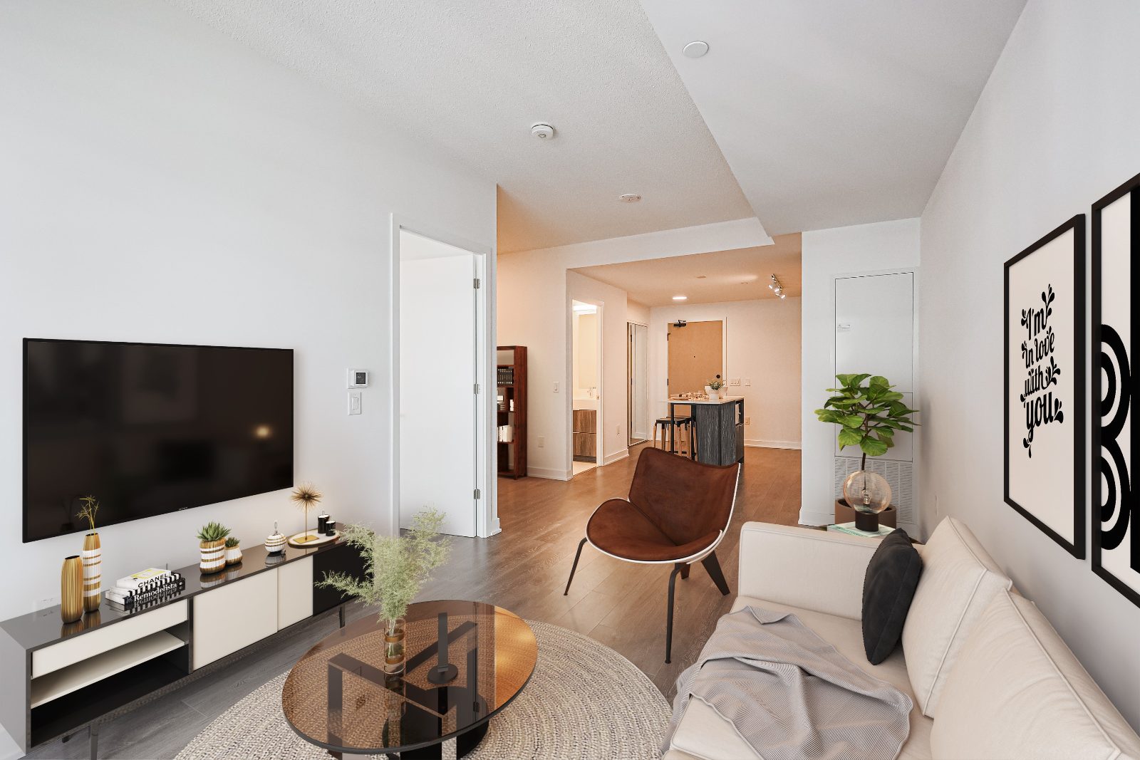 Living room looking toward kitchen island and entry