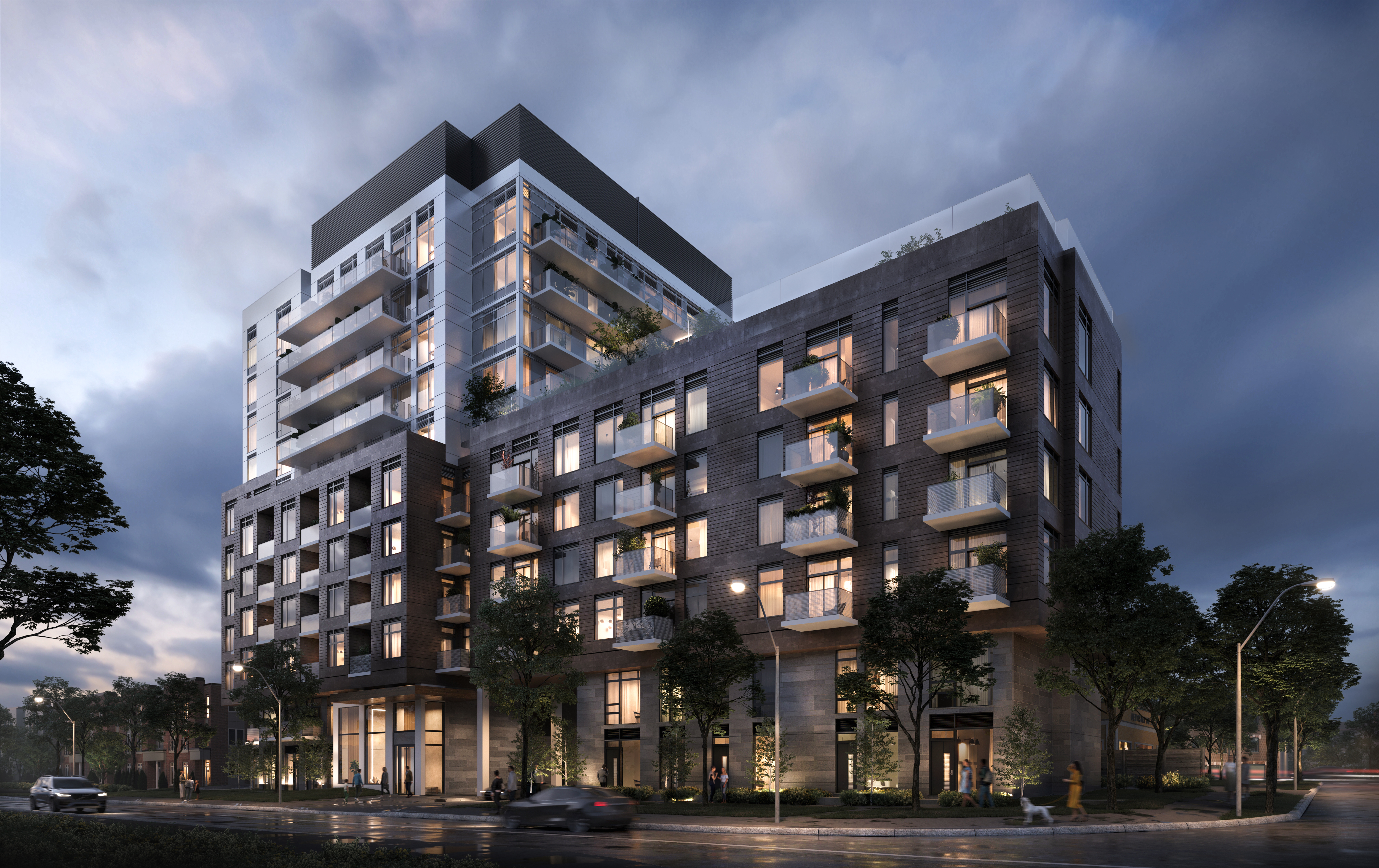 BLVD.Q boutique condominium exterior at dusk on The Queensway