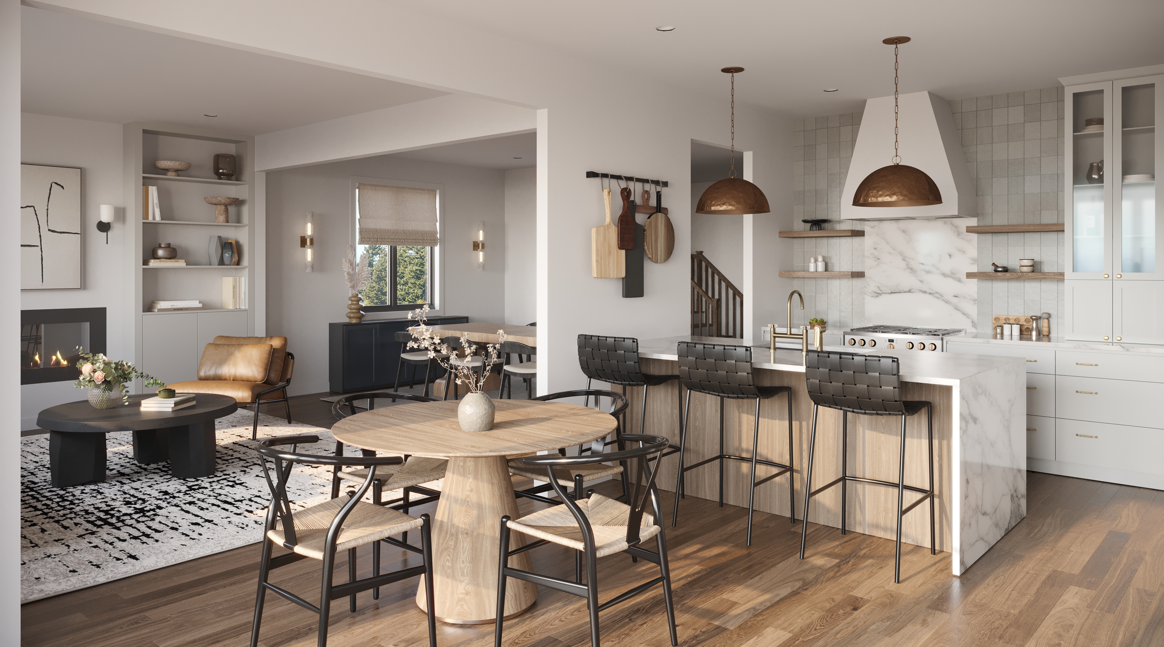 Open-concept kitchen and great room with island, fireplace and hardwood floors