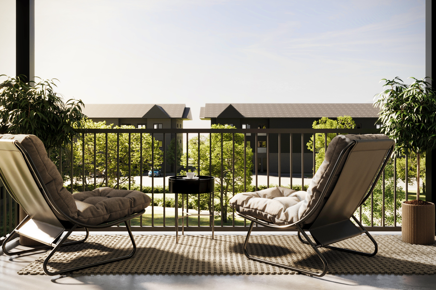 Private balcony with lounge chairs overlooking trees and neighbouring NOMI blocks