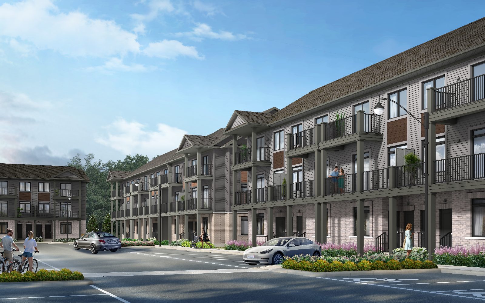 Rendering of a NOMI 3-storey stacked town block with balconies, brick base, and landscaped frontage