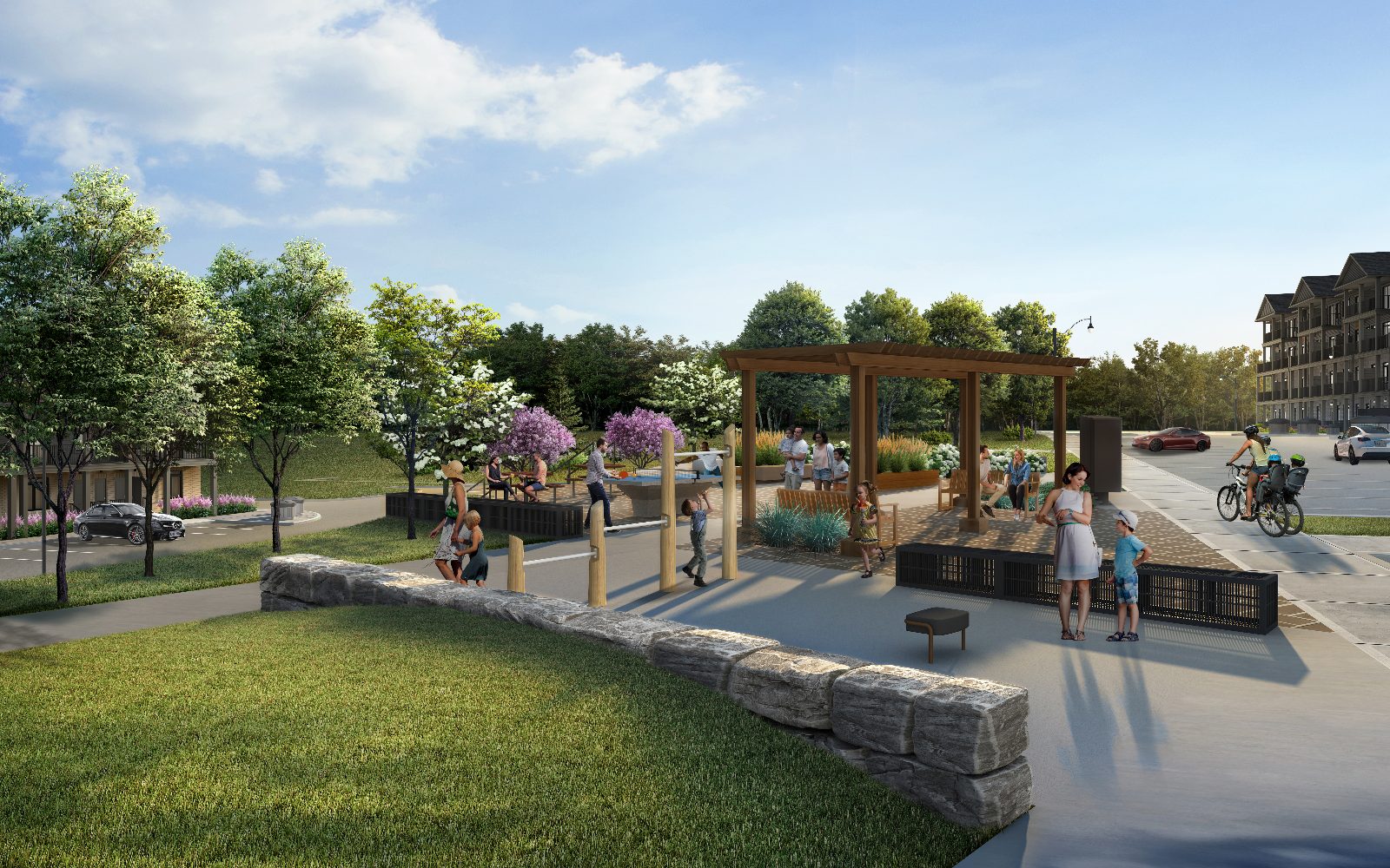 Central landscaped amenity space with pergola, ping-pong table, play elements, and seating