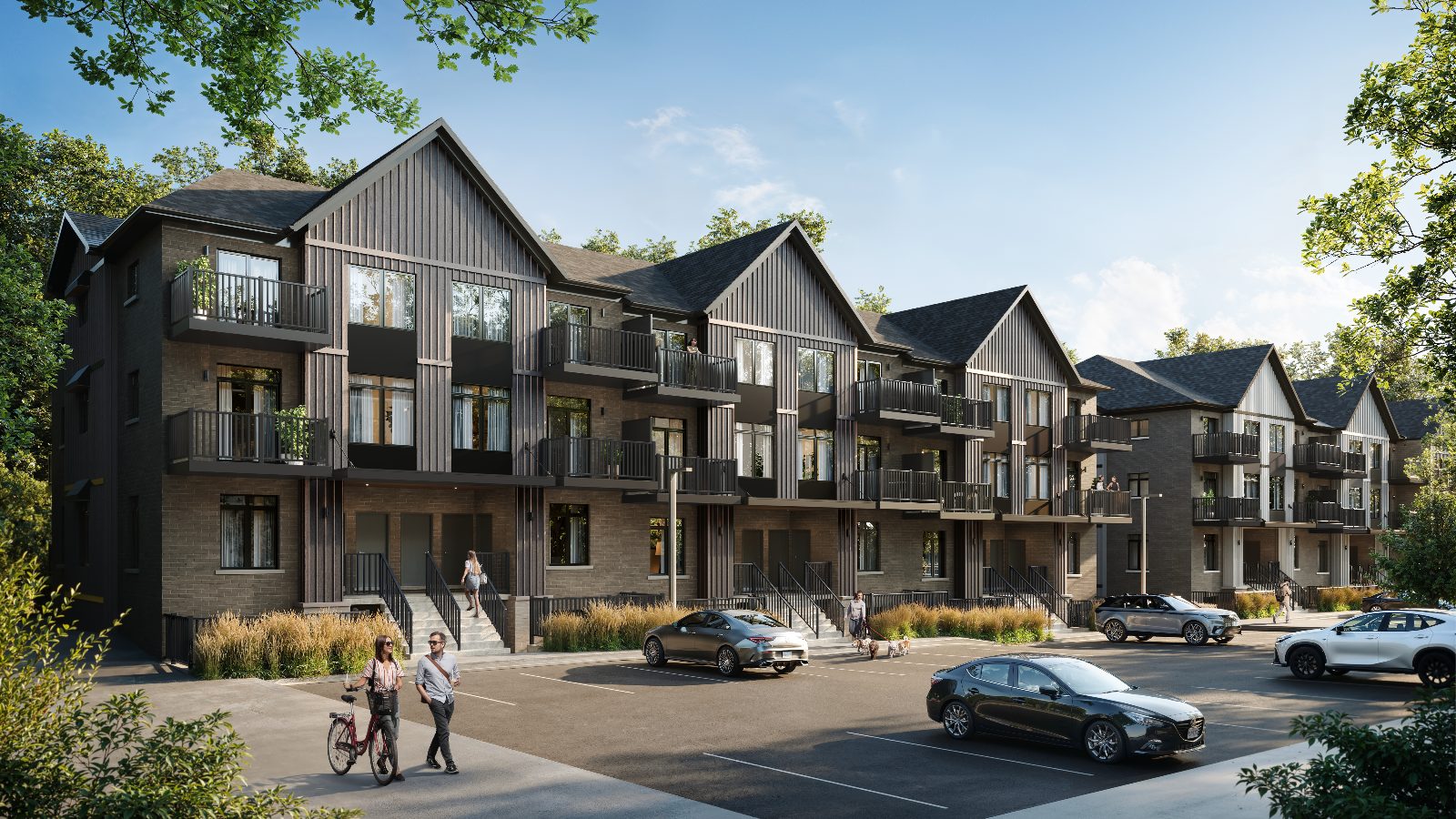 Northside Guelph townhome exteriors with residents walking