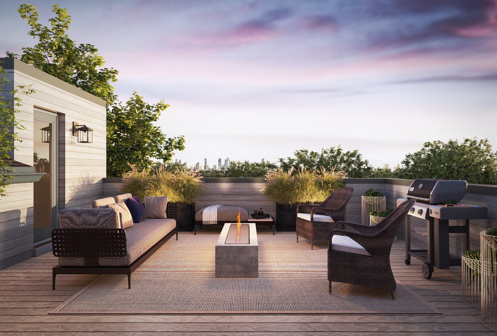 Rooftop terrace at dusk with lounge seating, fire table and barbecue overlooking treetops and a distant skyline — artist's concept