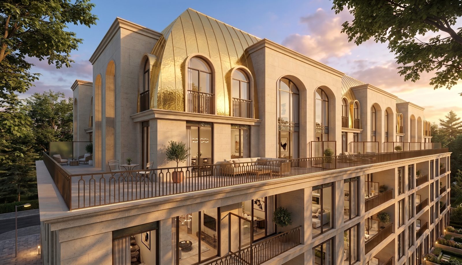 The Bridle Estate limestone façade with brass-toned curved roof at dusk