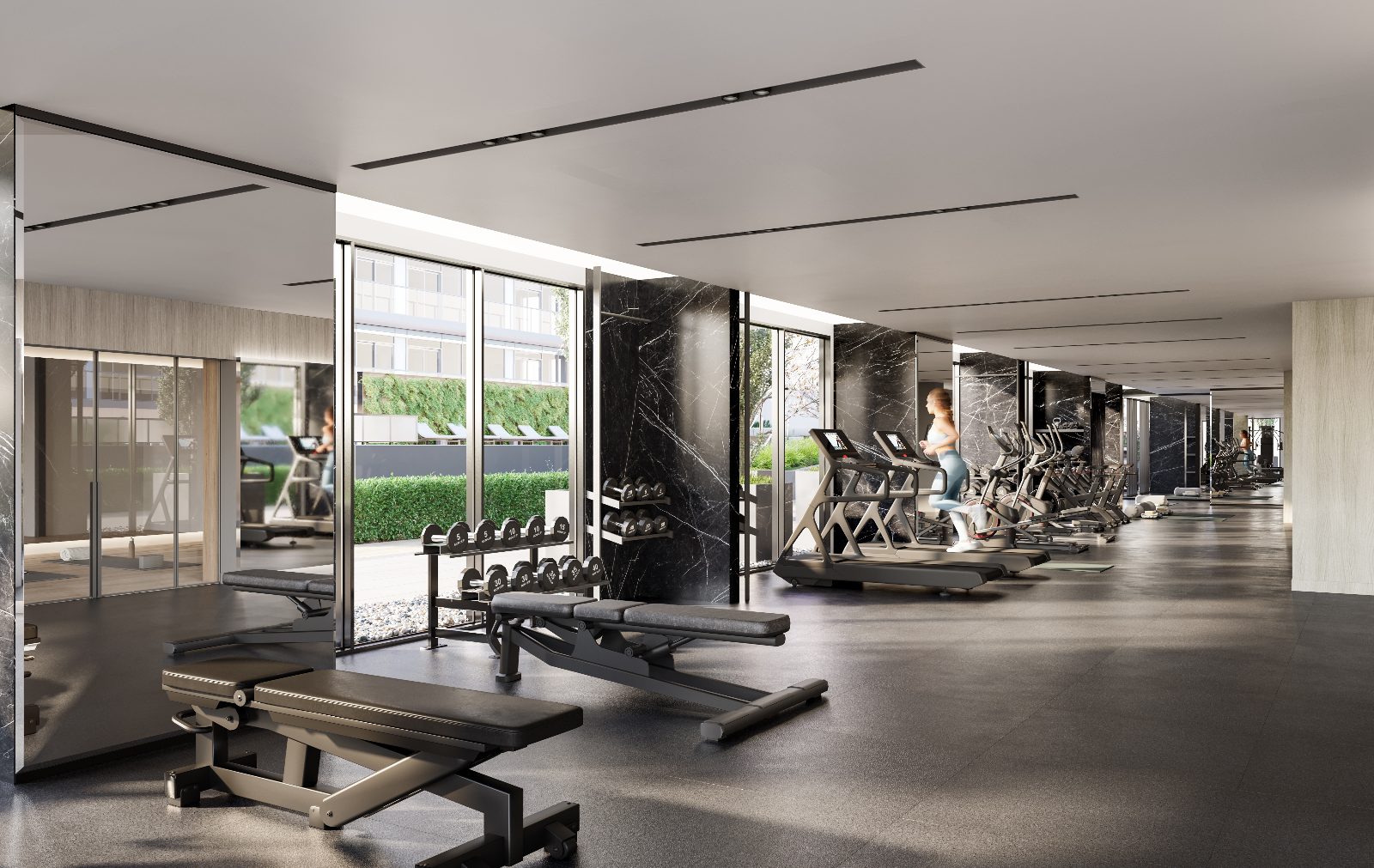 State-of-the-art fitness centre with marble walls and views to the pool deck