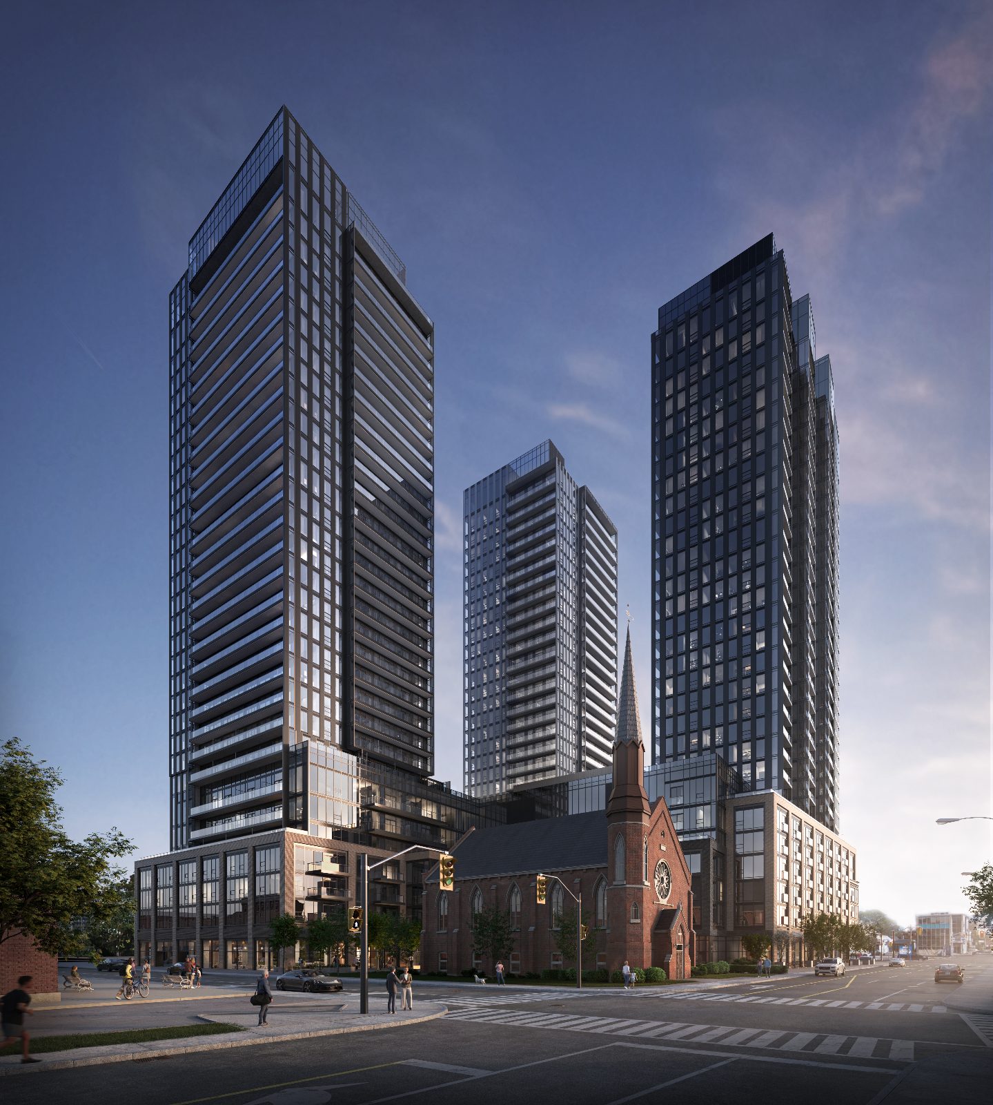The Design District's three towers rising above the historic red-brick 1868 church at the corner of Wilson St. in downtown Hamilton