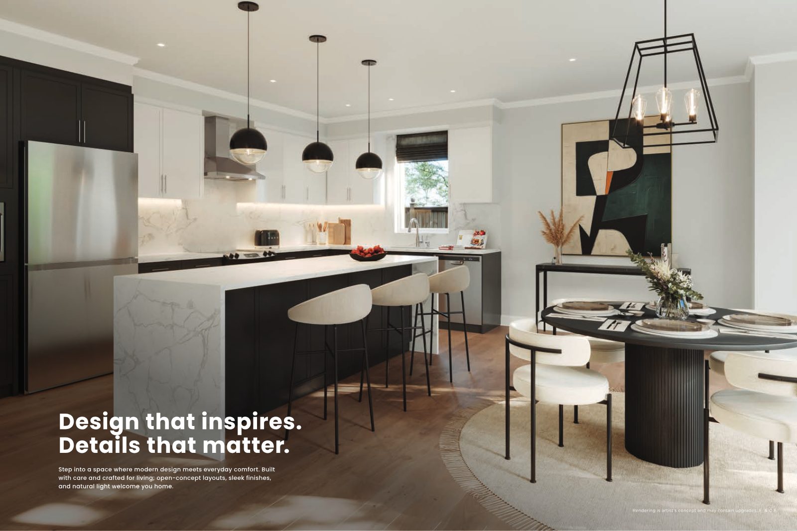 Open-concept kitchen with waterfall island, pendant lights and dining area