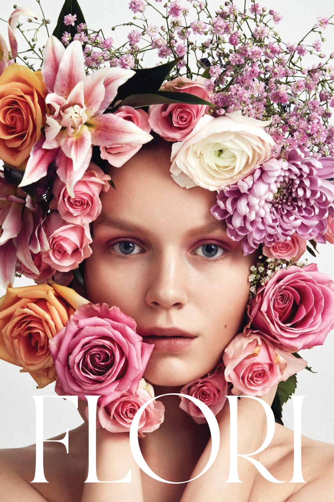 FLORI campaign image — a portrait framed in blooming roses and florals