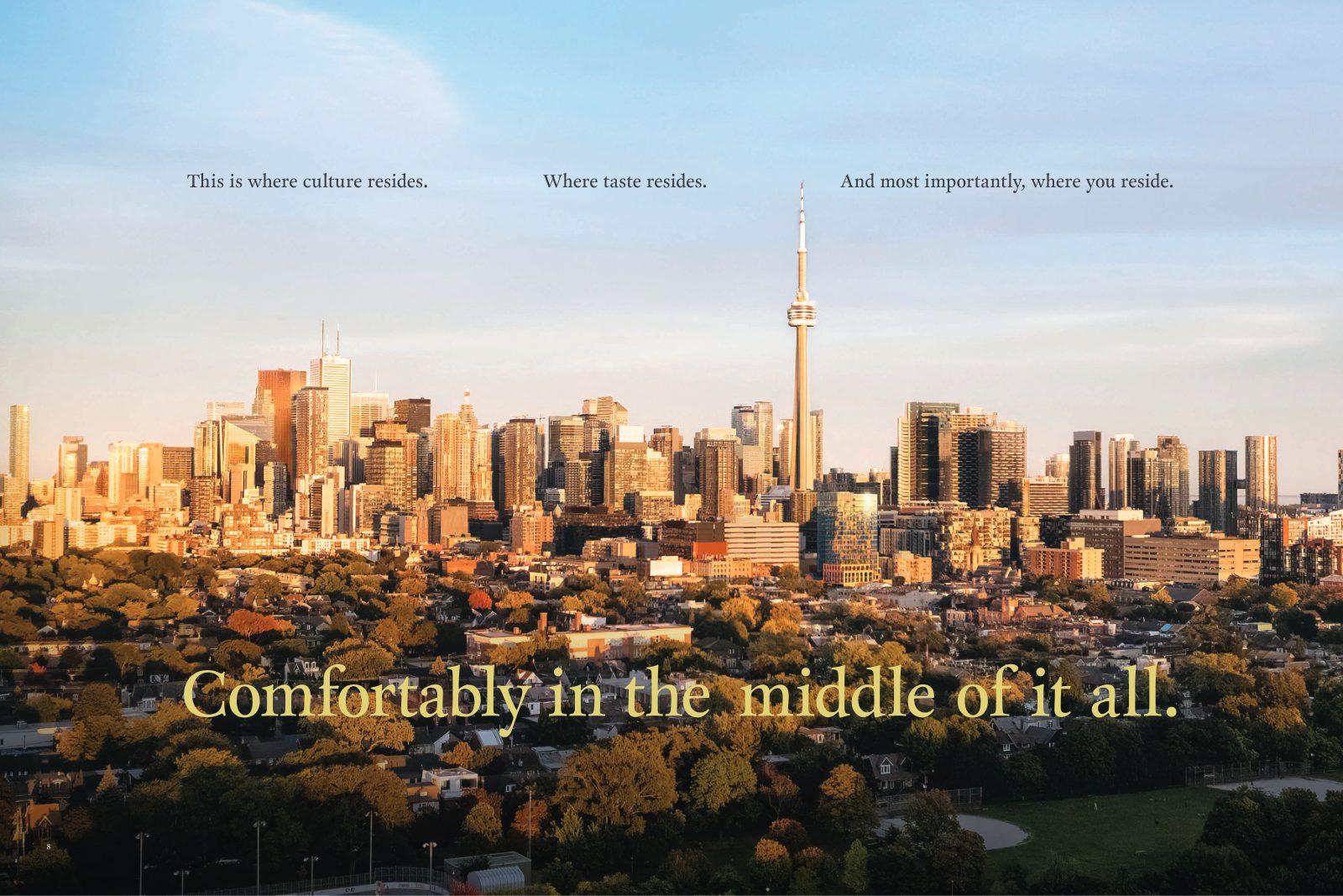 Toronto skyline at golden hour with the CN Tower — comfortably in the middle of it all