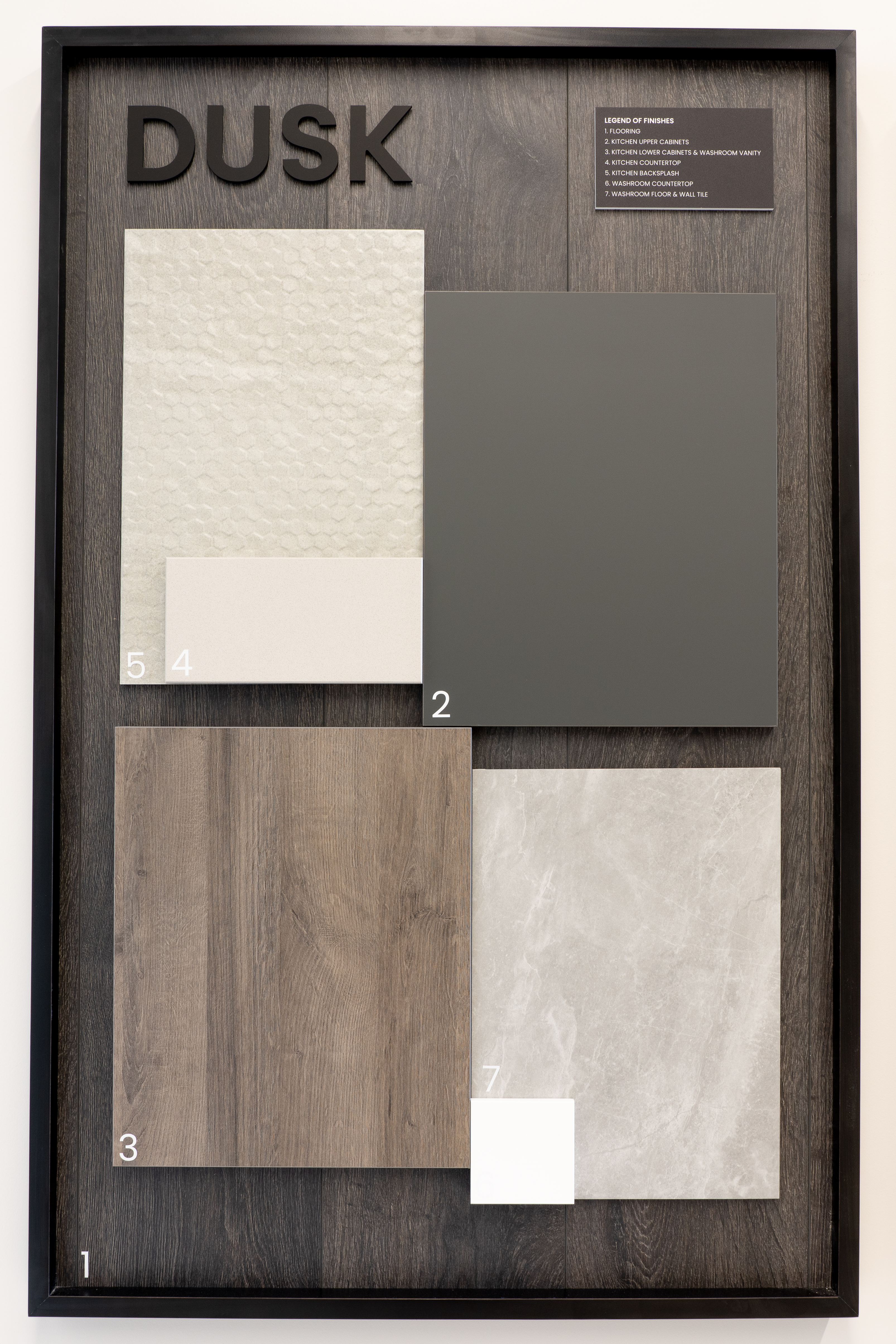 Dusk décor package finish board with warm wood, charcoal and stone tones