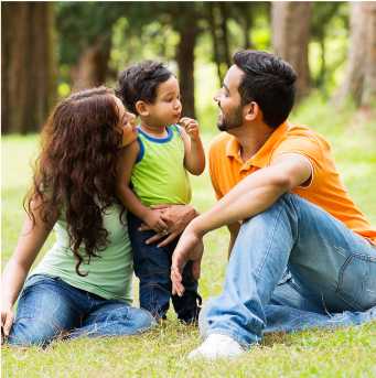 Family enjoying leisure time in a green park near Winchester Estates